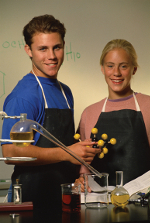 Two young students in a chemistry class